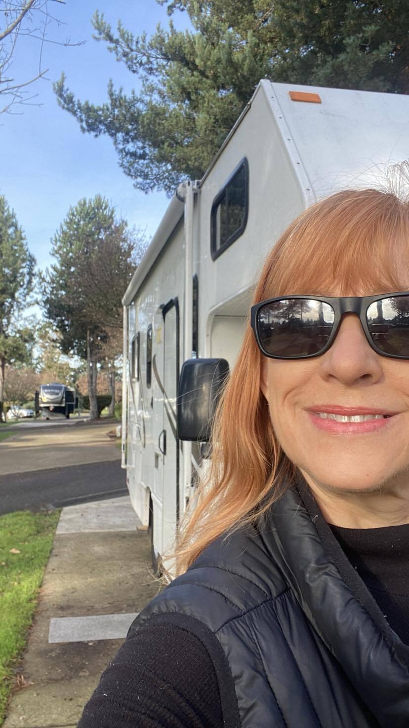 Janice Tylor standing in front of her RV at Sun Outdoors Portland RV park.